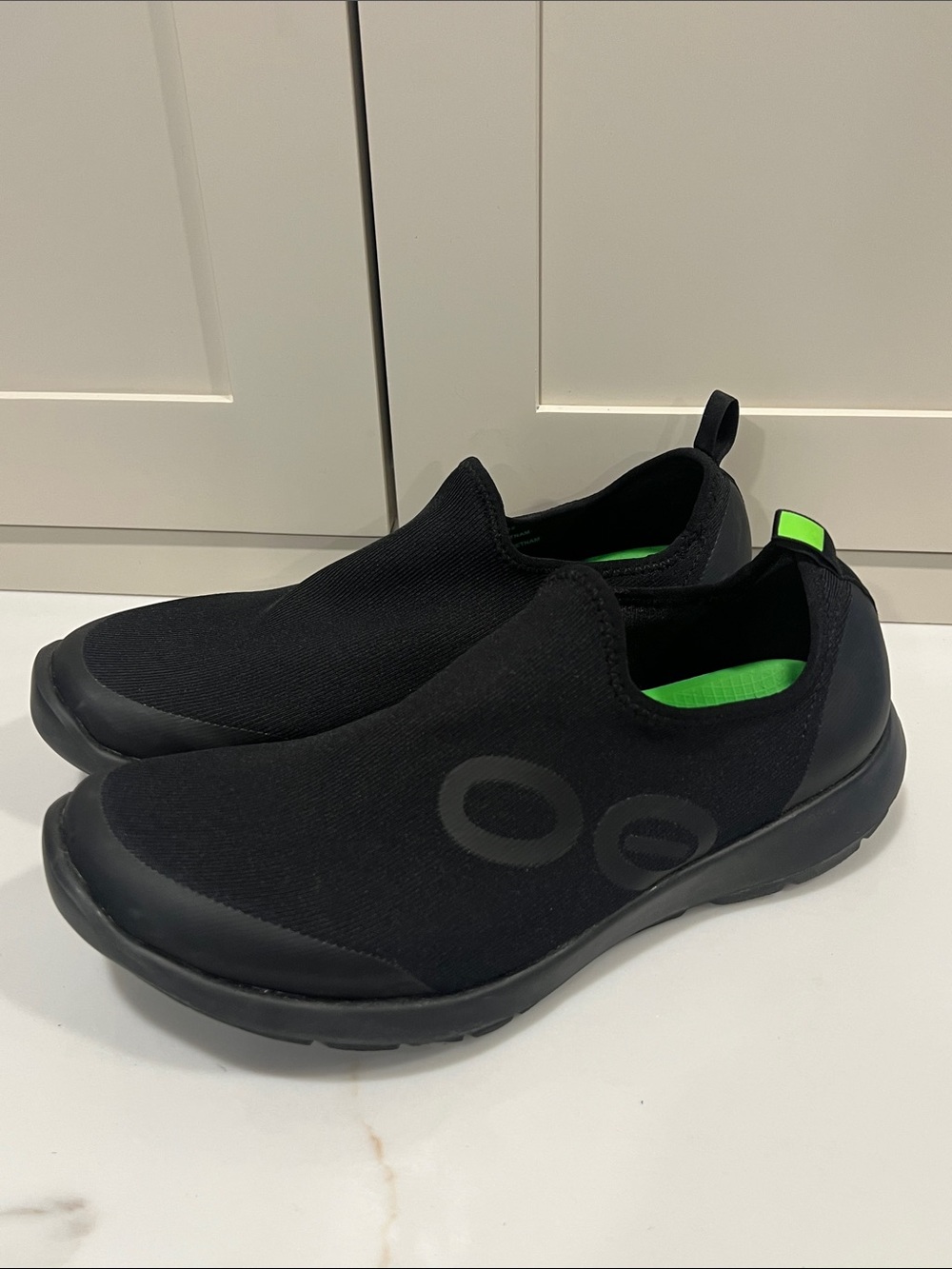 Oofos Women’s Slip-On Athletic Shoes in Black